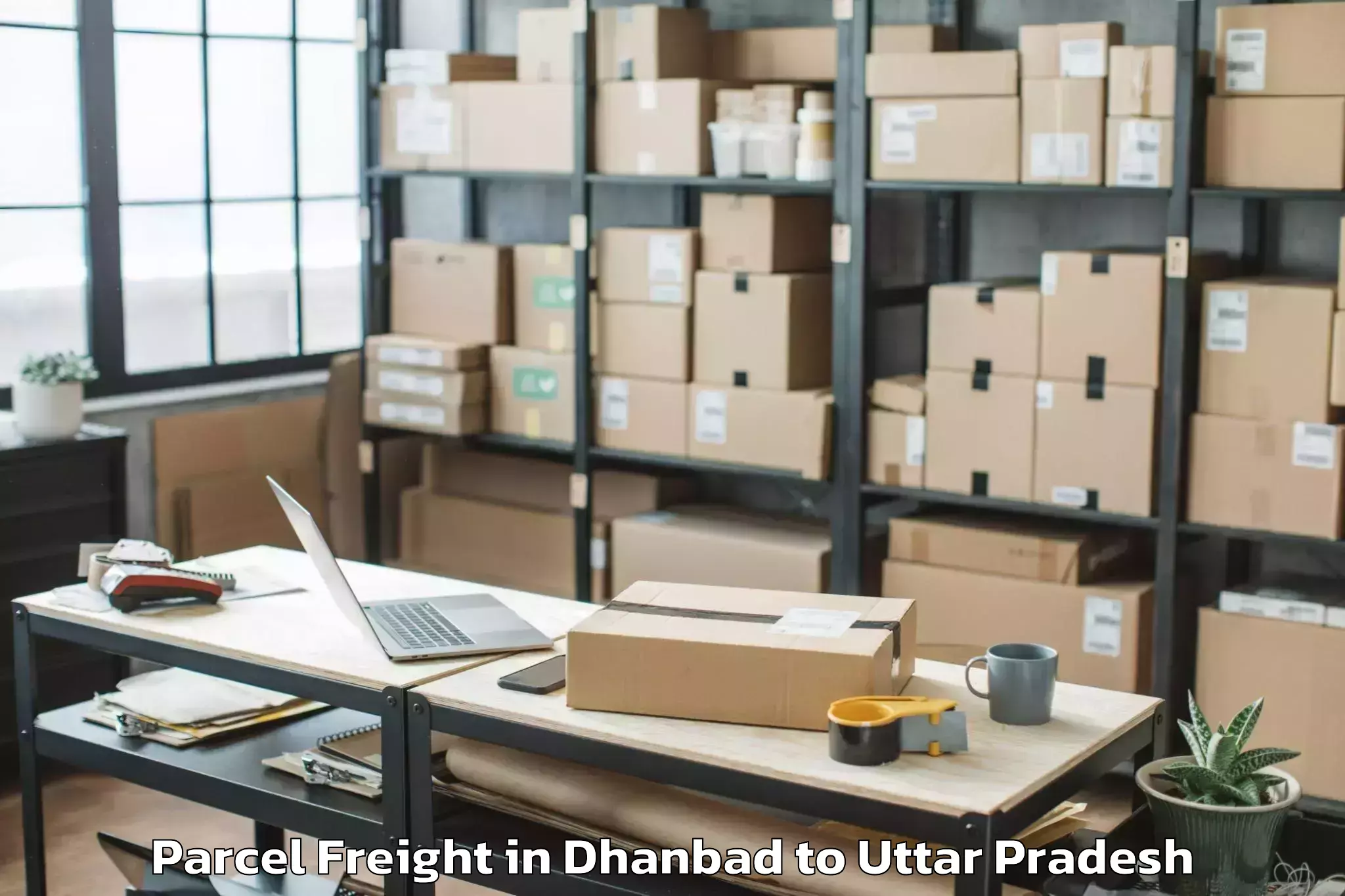 Leading Dhanbad to Bangarmau Parcel Freight Provider